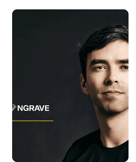 Portrait of a dark-haired man in a black T-shirt beside the NGRAVE logo