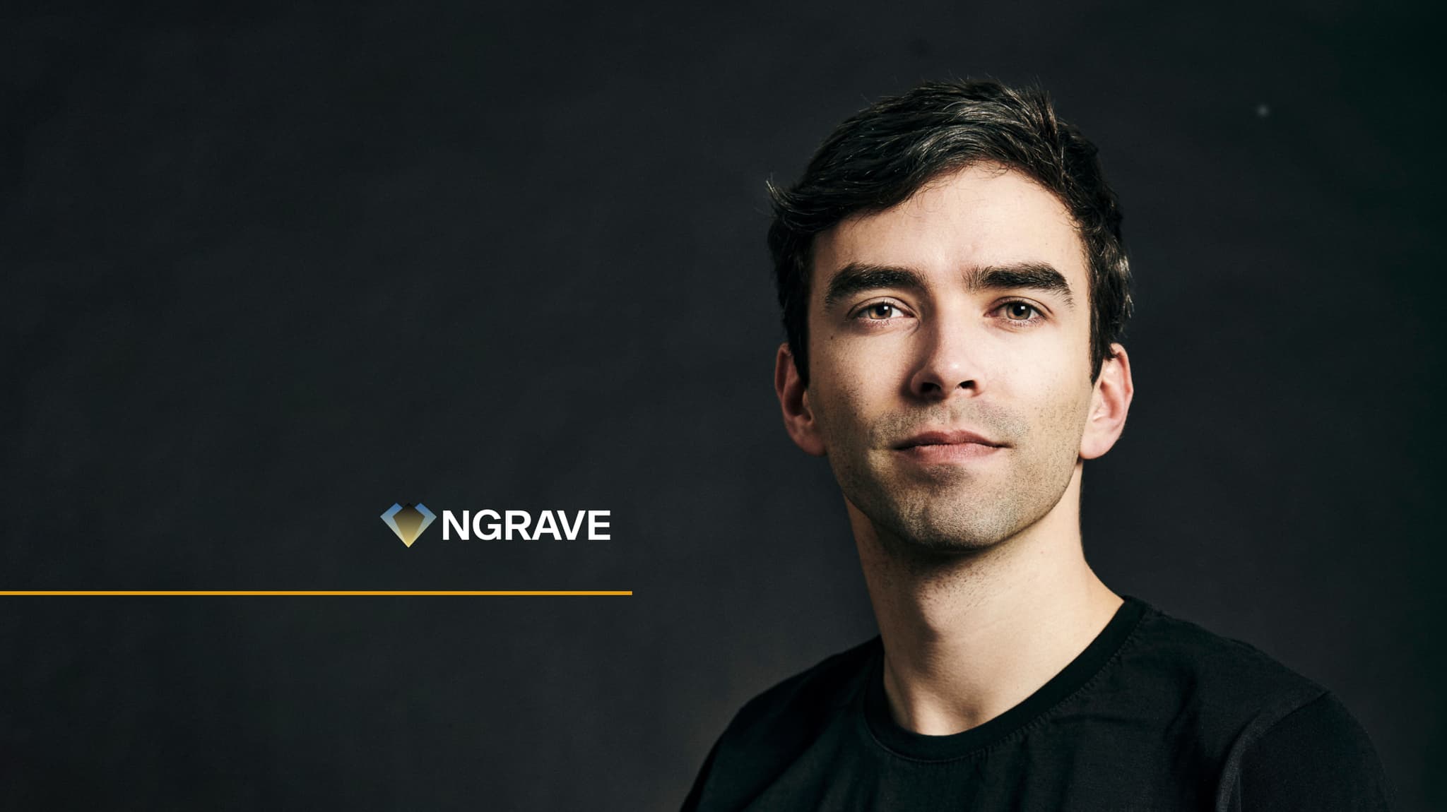 Portrait of a dark-haired man beside the NGRAVE logo